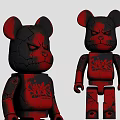 Artistic Black And Red Bear Sculptures With Cracked Texture And Graffiti Design
