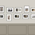 Stylish Photo Wall Display With Multiple Framed Pictures On Beige Wall
