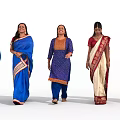 Women Posing In Traditional Sari And Kurta Outfits With Colorful Patterns