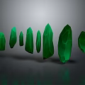 Green Crystals in Various Shapes with Glossy Surface on Gray Background