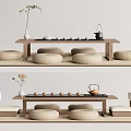 Modern Tea Table and Chairs with Round Cushions Tea Set Vase and Green Plant