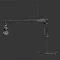Intricate Sculpture Carving Hanging On Metal Balance Scale With Tray