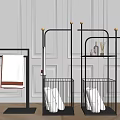 Modern Black Metal Bathroom Storage Shelves Featuring Gold Accents Towels and Toiletries