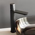 Modern Bathroom Interior With Round Illuminated Mirror Black Washbasin And White Cabinet