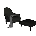 Modern Black Leather Lounge Chair With Ottoman And Cozy Throw Blanket