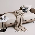 Beige Chaise Lounge With Geometric Pillow Cozy Blanket And Side Table With Books