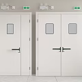 White Emergency Doors with Small Windows Black Handles and Green Exit Signs Above Light Walls