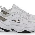 White Nike Casual Sneakers With Black Sole And Classic Logo Design