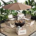 Outdoor Table and Chair Set With Umbrella Leafy Plants and Fruits on Wooden Deck