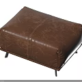 Brown Leather Ottoman With Textured Surface And Black Legs For Home Decor