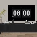 Modern Black TV Stand with Slatted Doors and Decorative Vase Sculptures on Light Wall Background