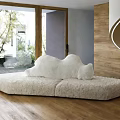 Plush Cream Two Seater Sofa In Bright Room With Large Window And Wooden Wall