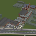 Aerial View of Red Brick School Building with Connected Structures and Green Courtyard