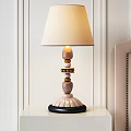 Elegant Wooden Layered Table Lamp With Beige Fabric Lampshade On Bedroom Bedside Table