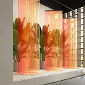 Orange Yellow Fringe Partition In Indoor Area With Green Plants And Window Light