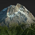 Mountain Terrain Featuring Snow Covered Peak Rocky Slopes And Lush Green Vegetation