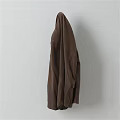 Soft Brown Towel Hanging On Wall As Essential Household Item For Daily Use