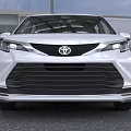 Toyota White MPV Exterior Design With Sleek Front Grille And Tinted Windows