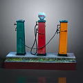 Vintage Shell Gasoline Pump Models In Green Red Orange With Mossy Base