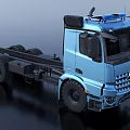 Blue Heavy Duty Utility Truck With Multiple Wheels And Blue Warning Lights On Top