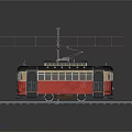 Vintage Red And Black Tram On Railroad Tracks With Overhead Electric Wires
