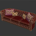 Red Leather Tufted Three Seater Sofa With Patterned Decorative Pillows And Classic Design