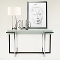 Modern Console Table With Glass Top Metal Frame Lamp And Artwork