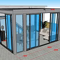 Modern Glass Garden Conservatory With Table Chairs And Outdoor Plants