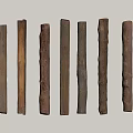 Stone Wood Long Sticks in Various Shapes and Colors Neatly Arranged on Light Background