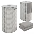 Modern Cylindrical Laundry Hampers In Black And Brown With Towels