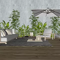 Modern Outdoor Sofa with Green Plants and Patio Umbrella on Wooden Deck