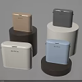 Colorful Mipow Square Living Essentials Displayed On Different Colored Cylindrical Bases