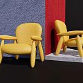 Two Yellow Leisure Chairs Against Blue And Red Walls On Black Floor With White Pedestal