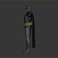 Man in Batman Costume Posing with Arms Outstretched Against Gray Background
