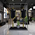 Modern Clothing Store Interior With Mannequins Clothing Racks And Green Plants