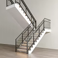 Modern Interior Staircase With Metal Railings Glass Panels And Wooden Steps