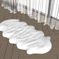 White Fluffy Cloud Shaped Plush Carpet On Wooden Floor Living Area