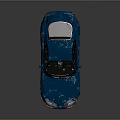 Blue Sports Car with Rear Spoiler Black Windows Silver Wheels and Glossy Sleek Body Finish