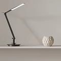 Modern Table Lamp With Adjustable Arm Black Frame Long LED Light And White Textured Vase