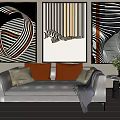 Stylish Living Room Decor With Abstract Paintings Sofa Cushions And Plant
