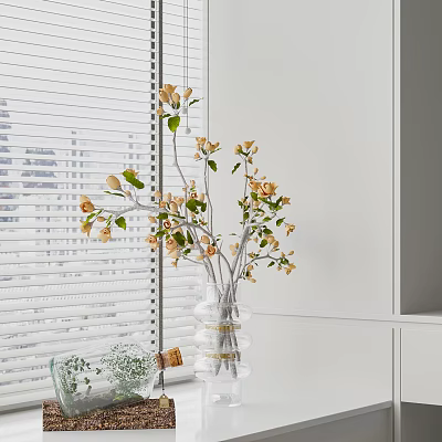 Transparent Glass Vase With Light Yellow Flowers And Green Leaves By White Blinds And Cabinets 3d model