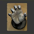 Medical Device Hand Model With Black Base And Light Colored Mat For Training And Education