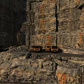 Rocky Cliff Landscape with Dump Trucks on Gravel Ground and Steep Rock Walls