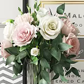 Glass Vase With Pink And White Roses Green Leaves Brass Candle Holders Chevron Background