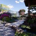 Garden Landscape Design With Stone Path Pond Wooden Gazebo And Colorful Flowers