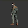 Man Wearing Green Jacket With Orange Patches Green Pants And Brown Boots