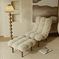 Plush Beige Single Seater Sofa With Matching Ottoman Wooden Spiral Floor Lamp And Light Area Rug