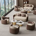 Modern Hotel Lobby Interior With Beige Brown Sofas Armchairs Round Coffee Tables And Large Windows