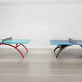 Modern Ping Pong Tables With Blue Tabletop Red And Black Frames In Indoor Setting