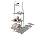 Modern Bookcase With Metal Frame Wooden Shelves And Books Potted Plant Folded Blanket